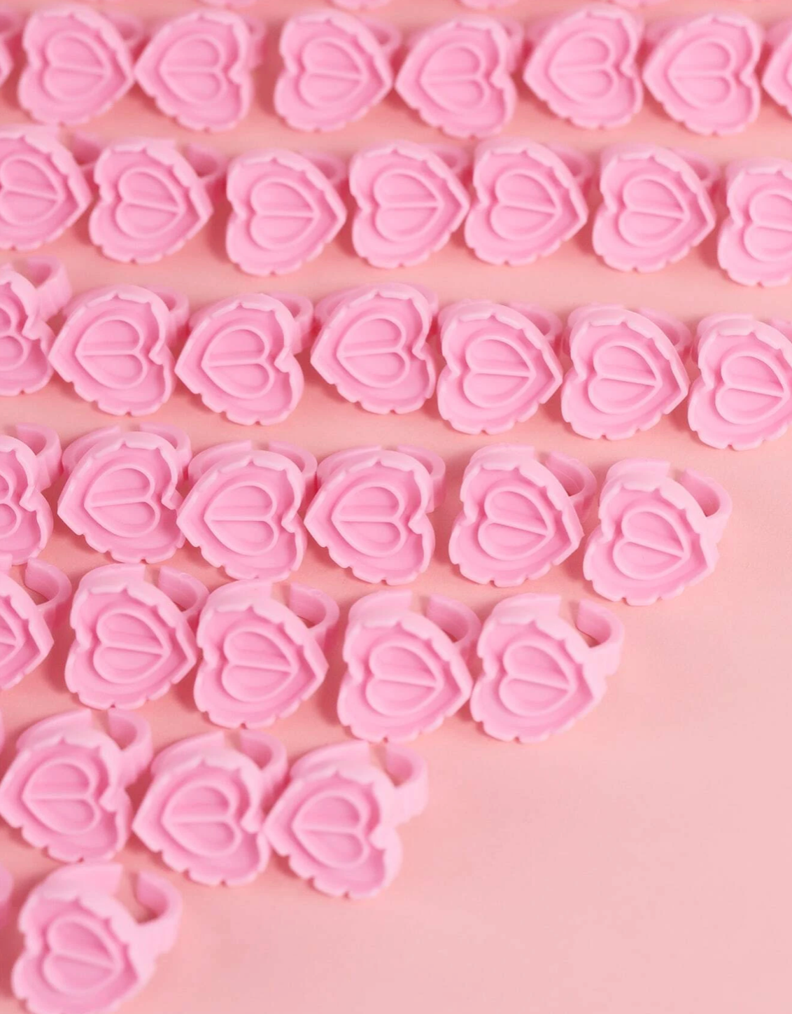 Anillos de pegamento de corazón rosa